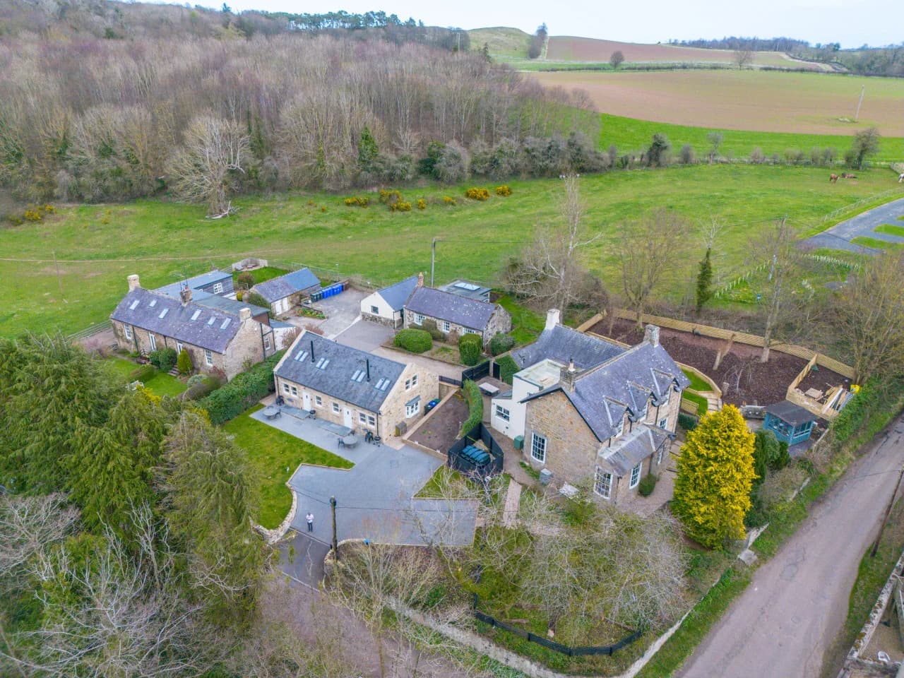 Aerial view of the Spindlestone cottages and surrounding countryside