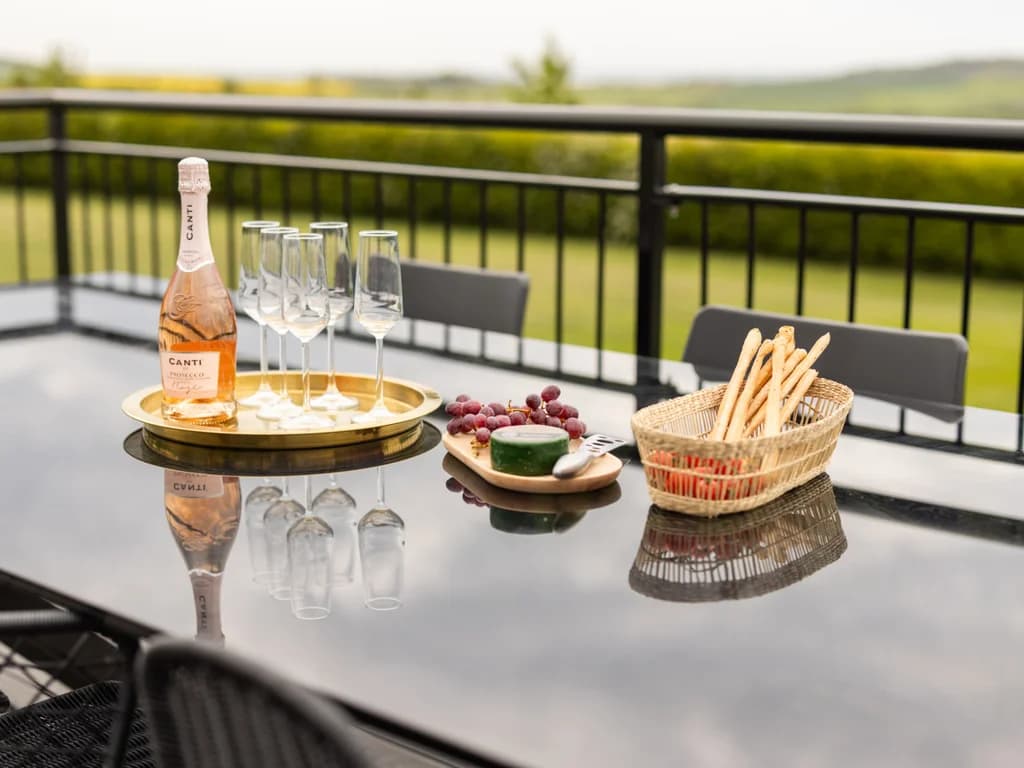 Chilled Prosecco on the terrace overlooking Northumberland countryside.