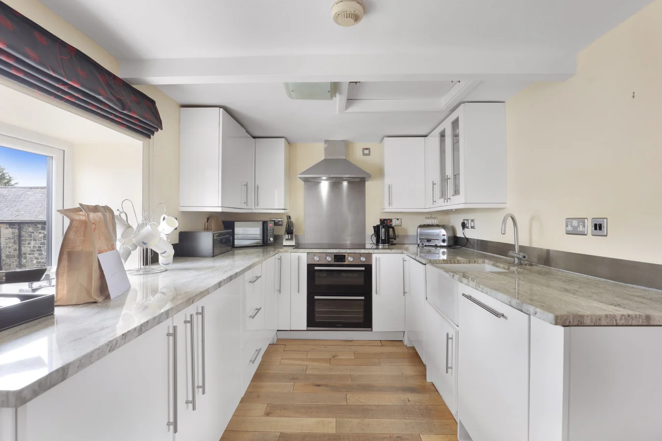 Galley kitchen with integrated appliances