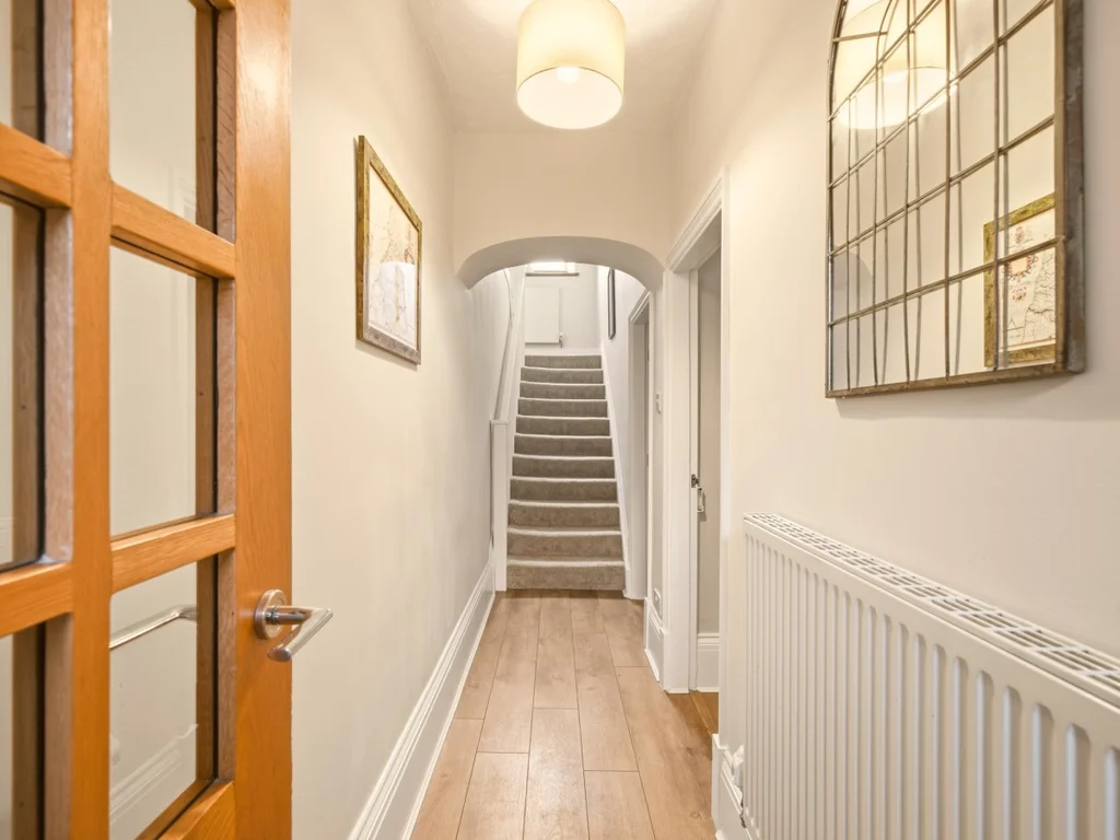 Entrance hallway with staircase leading to the upper floors.