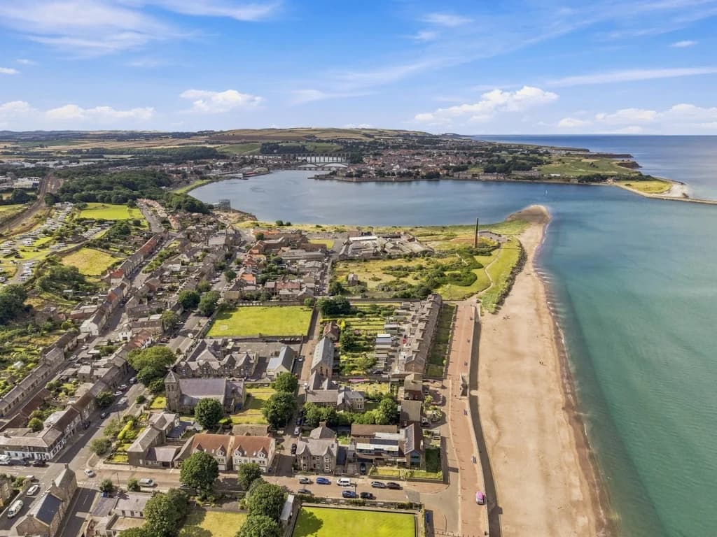 Panoramic aerial view of Spittal Beach and Berwick-upon-Tweed coastline.
