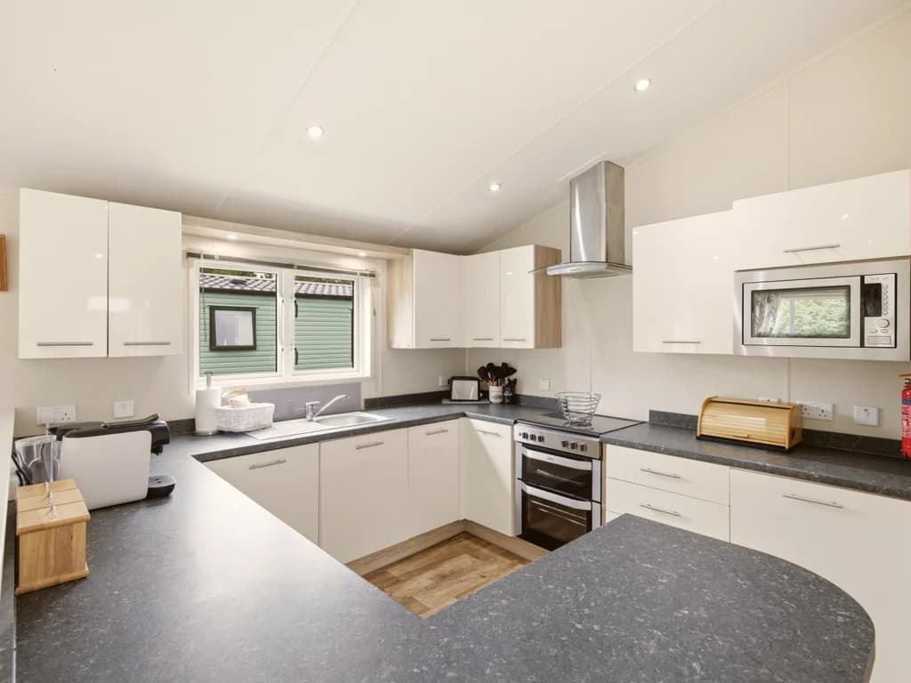 Well-equipped kitchen with generous worktops and integrated appliances