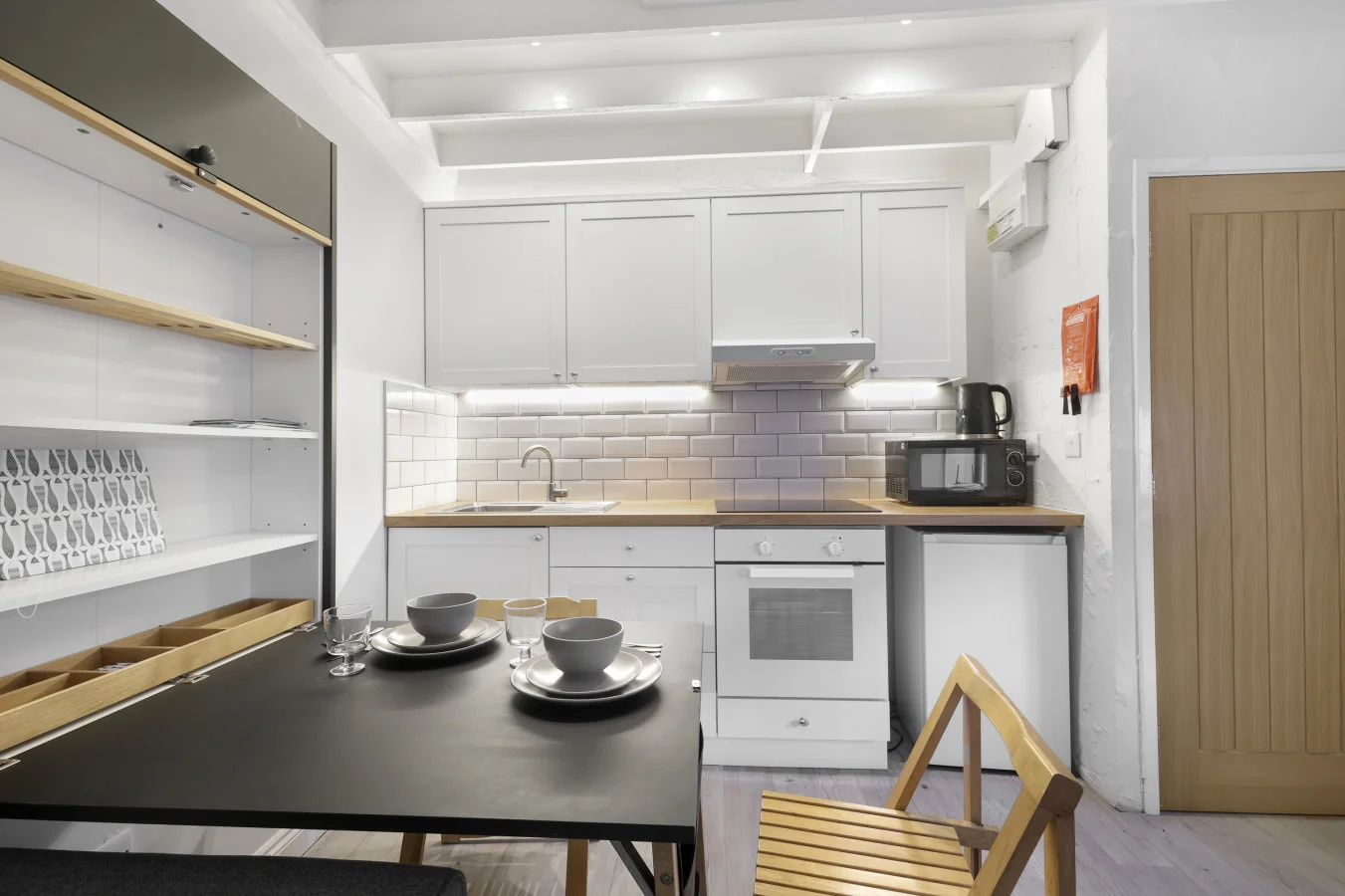 Open-plan kitchen and dining area with space to unwind after the coast
