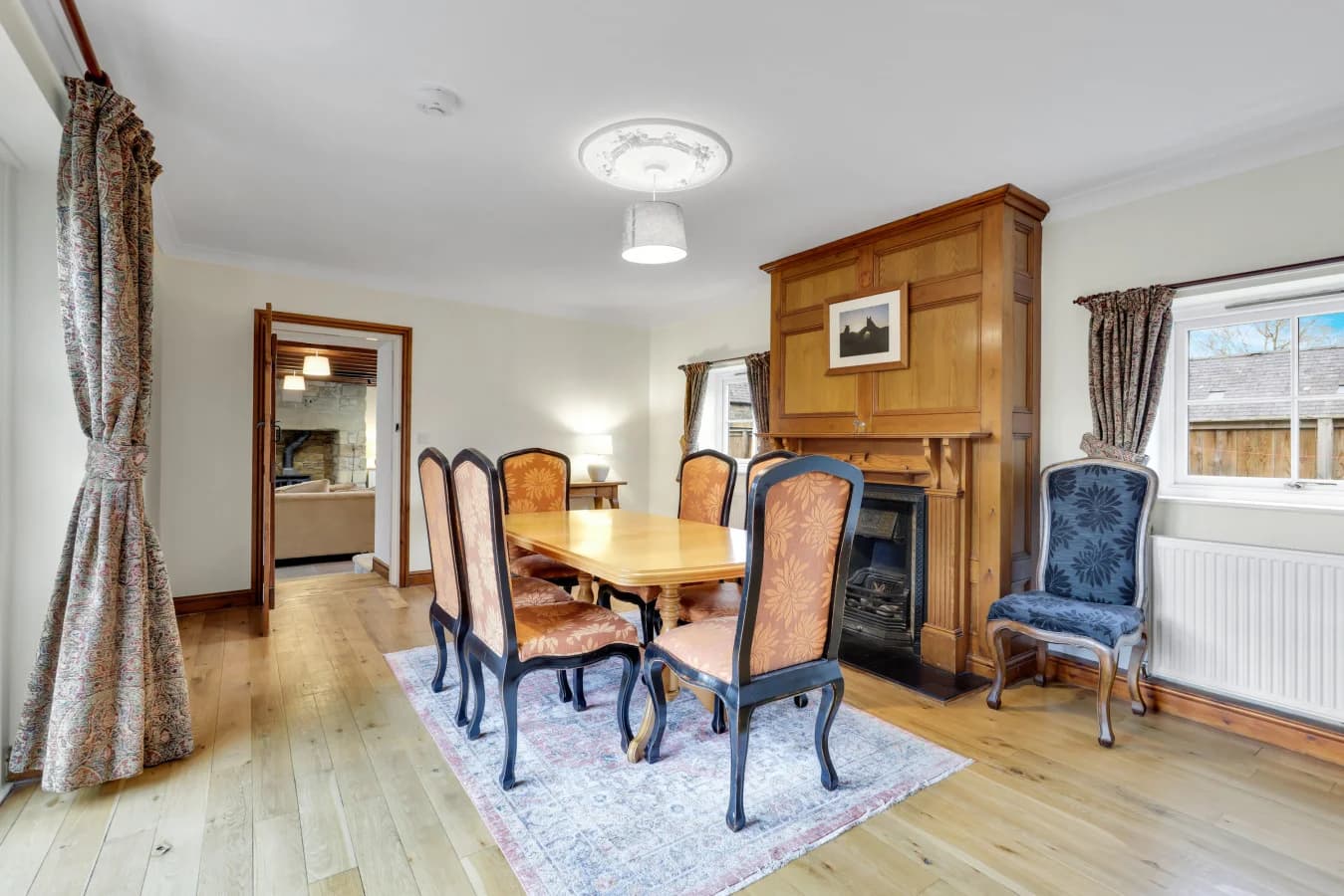 Elegant dining room with oak furnishings and period character