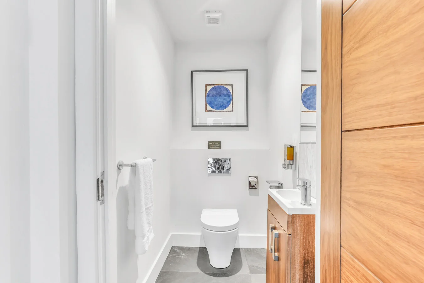 Ground-floor cloakroom with vanity unit and WC