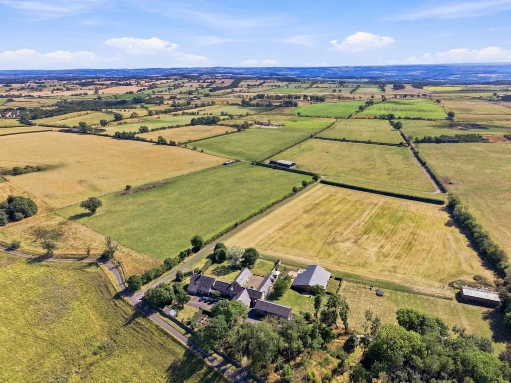 Aerial view across the rolling Northumberland countryside