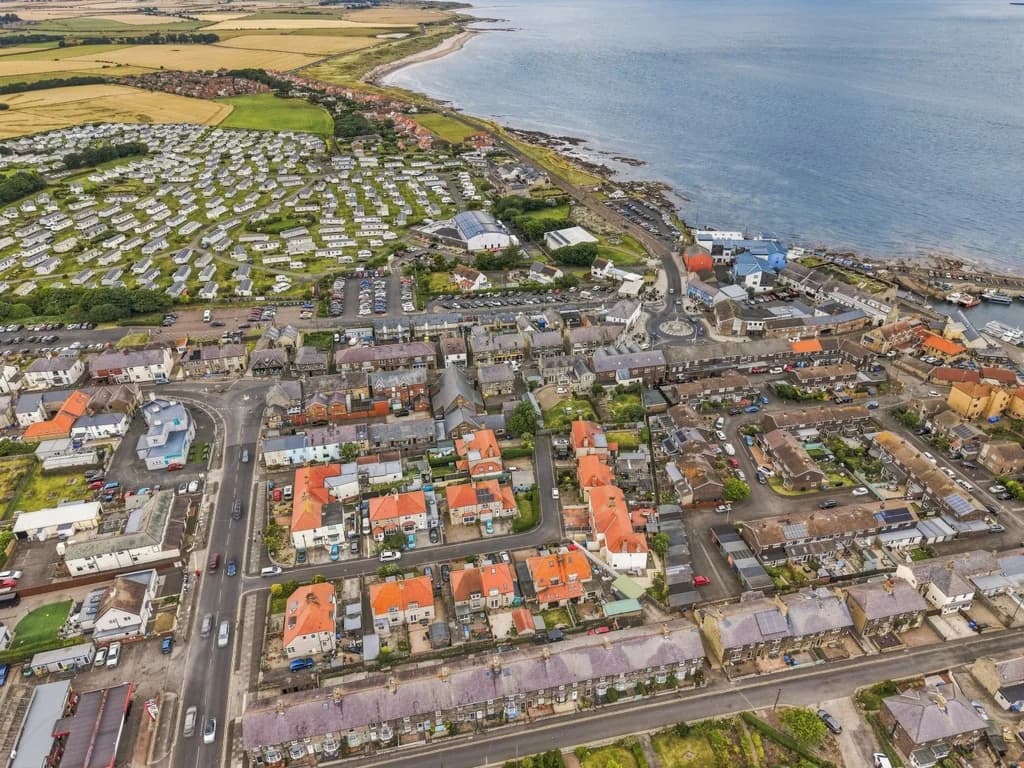 Elevated view across Seahouses, the harbour and surrounding coastline.