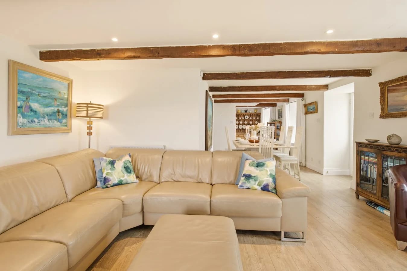 Open-plan living and dining area with corner sofa