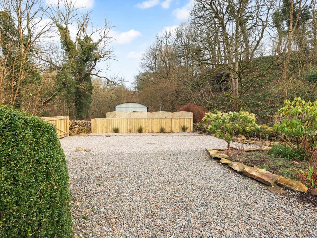 A large gravel driveway.