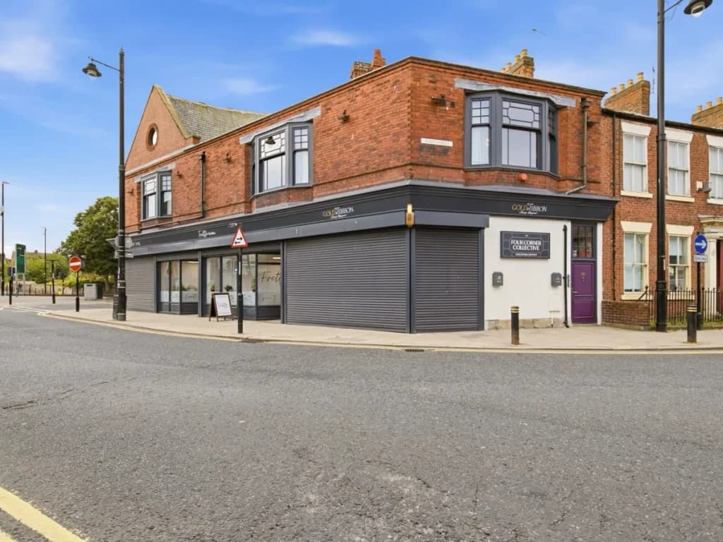 Exterior view of The Four Corner Collective on the corner of Mary Street.