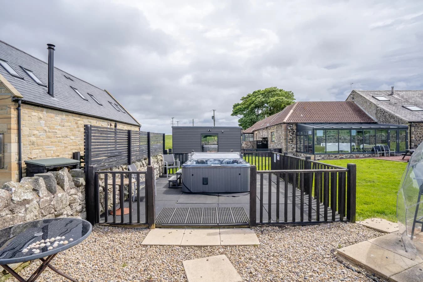 Shared hot tub within the communal courtyard garden