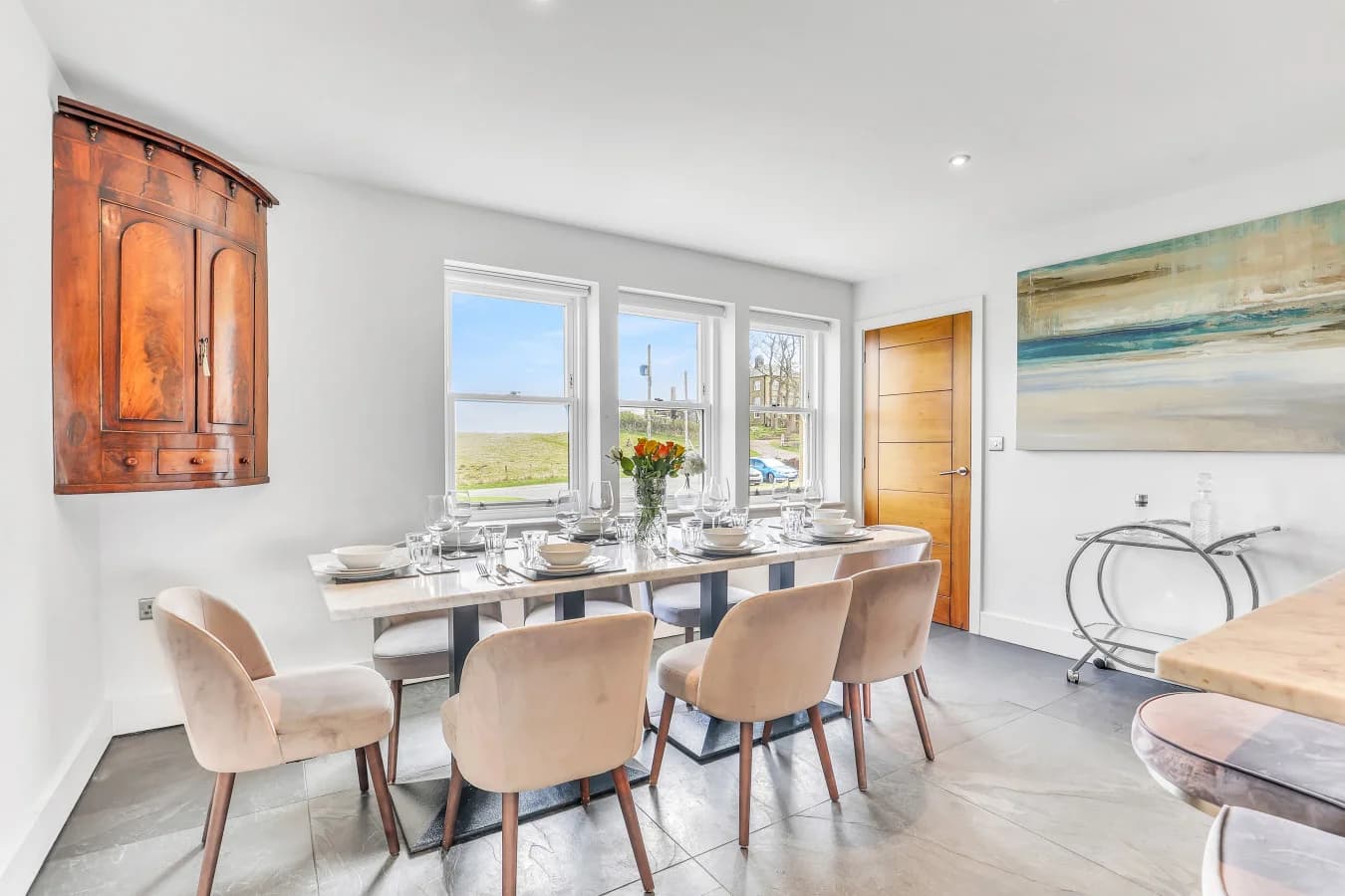 Open-plan dining area with patio doors to the garden