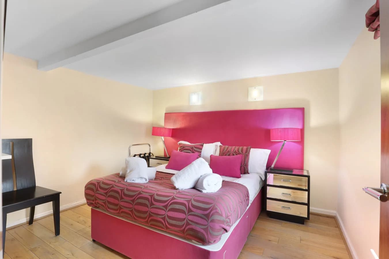 Double bedroom with bedside tables and skylight