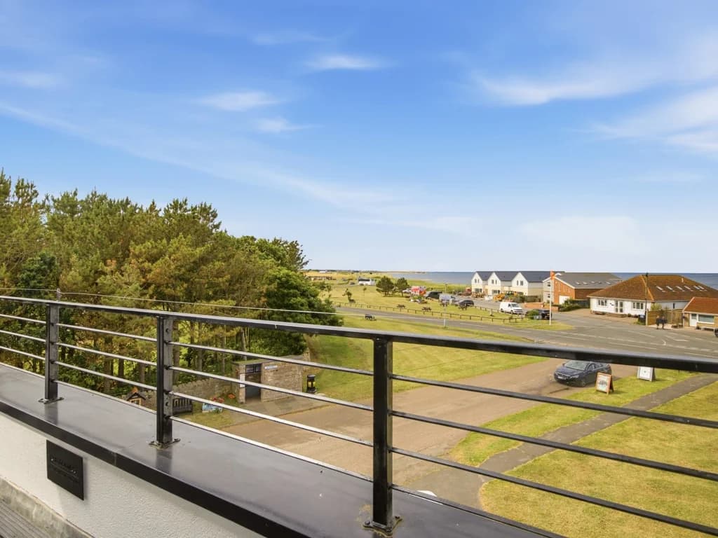 Elevated balcony boasting beautiful views towards Beadnell Beach and coastline