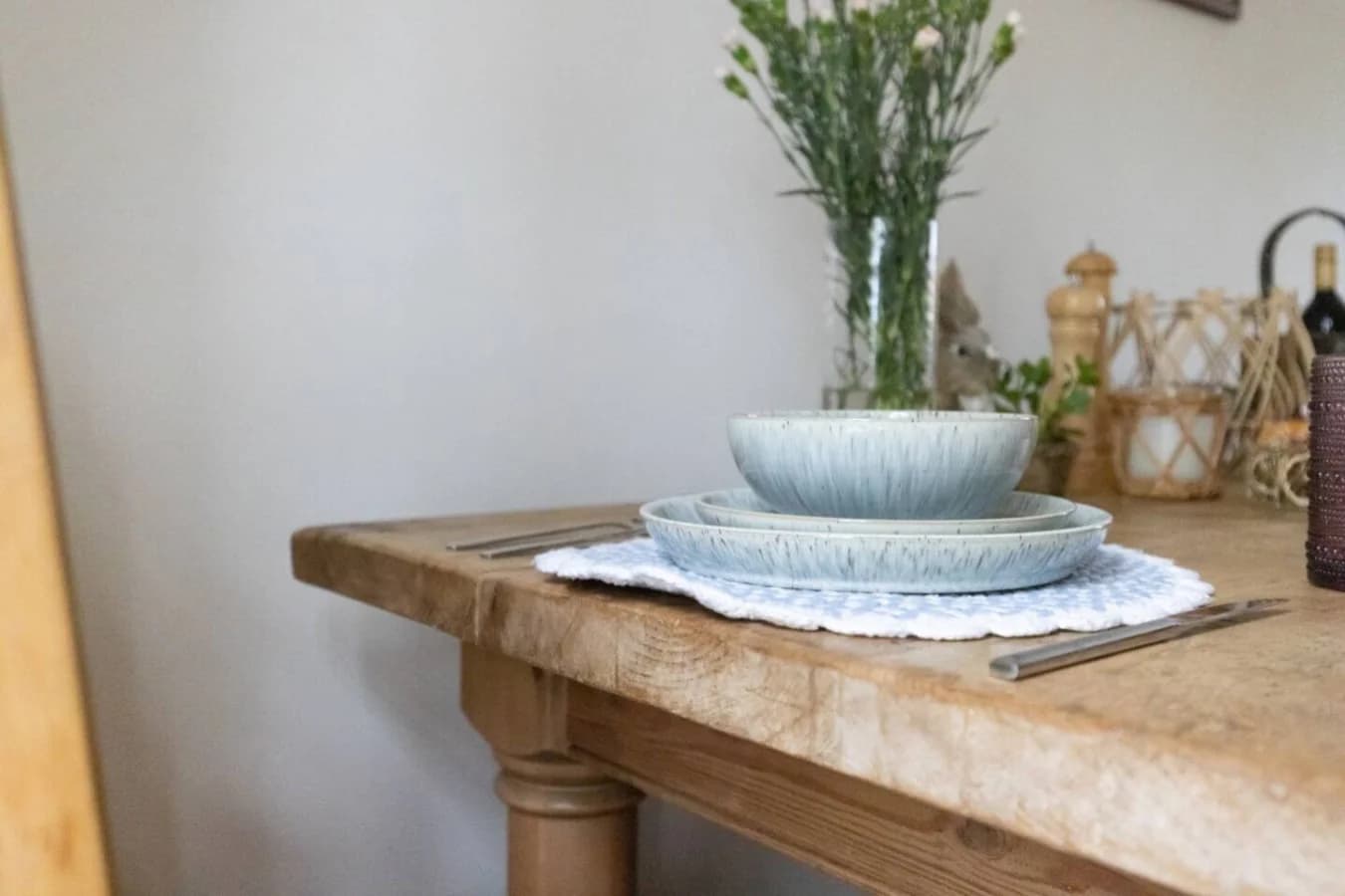 Rustic dining table dressed for relaxed meals