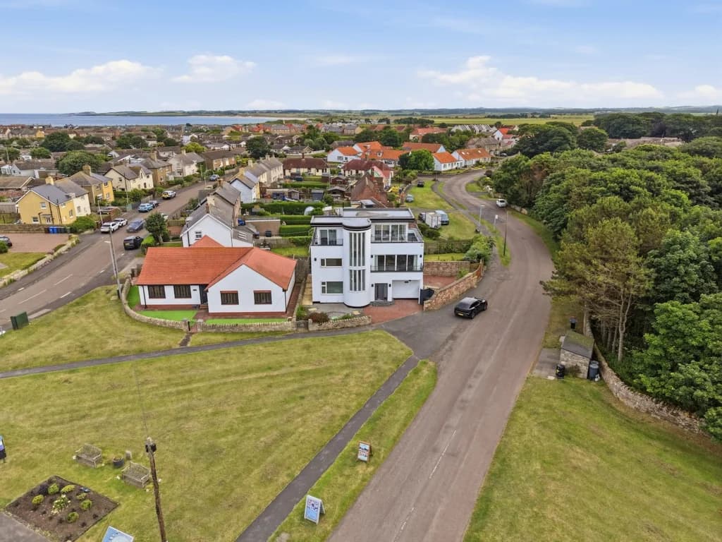 Aerial view of Beadnell Point opposite the beach and Northumberland coast