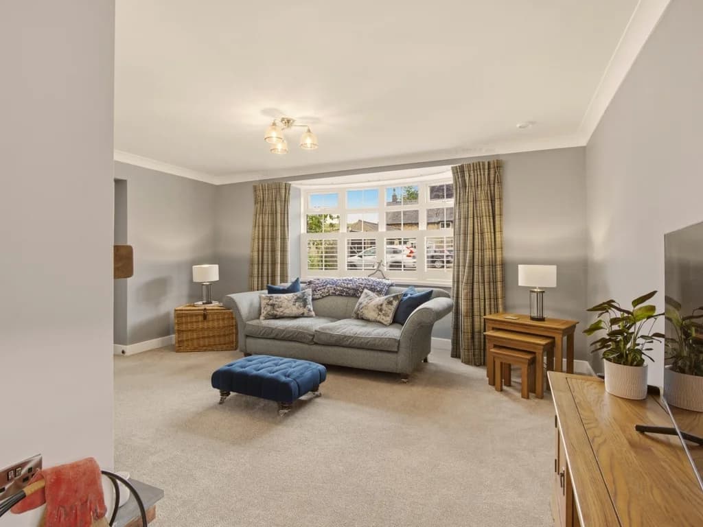 Bright lounge with soft neutral décor and comfortable seating for everyone