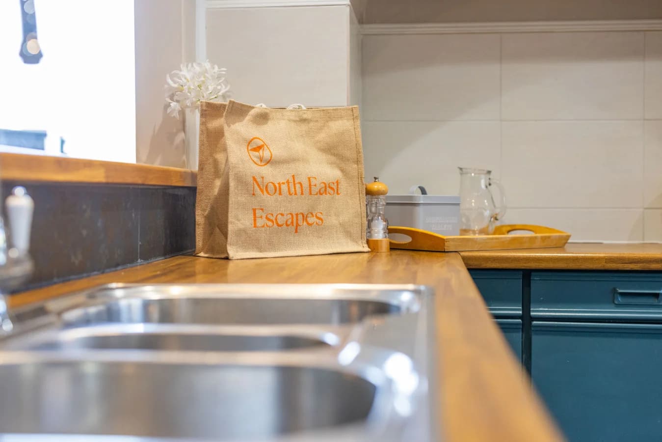 Belfast sink and timber worktop with Bamburgh First welcome pack