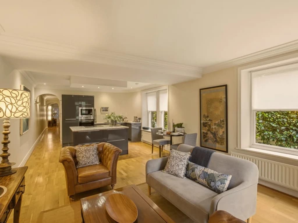 Open-plan living and dining area with views towards the garden