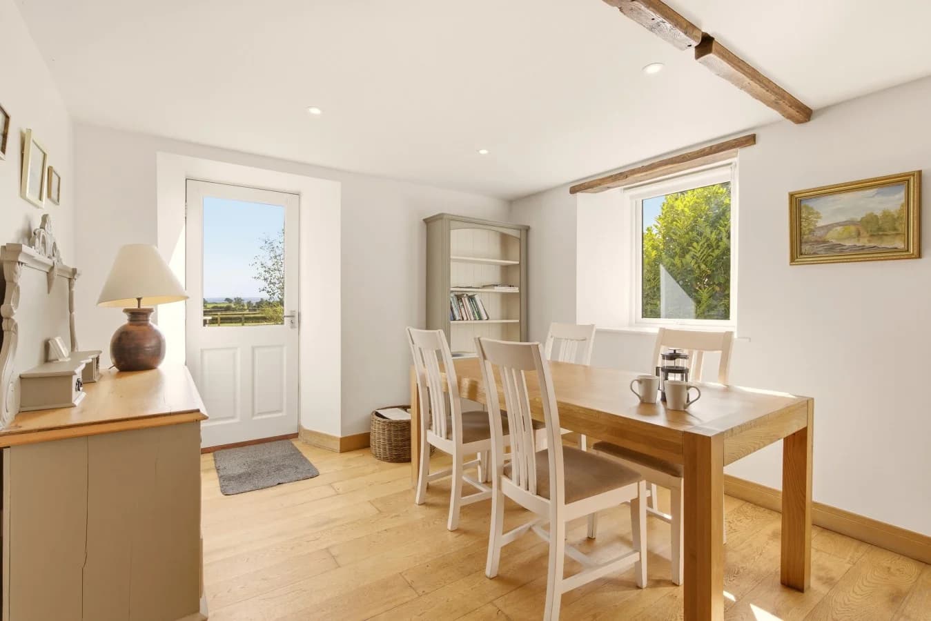 Dining area with countryside views and seating for guests