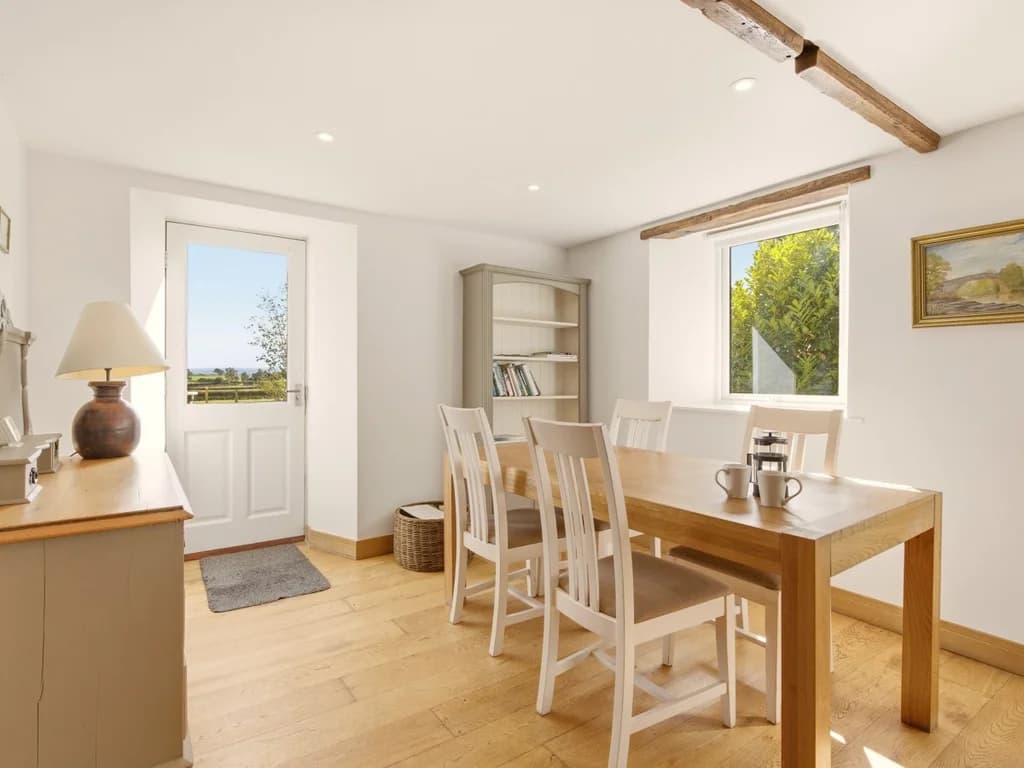 Dining area with countryside views and seating for guests