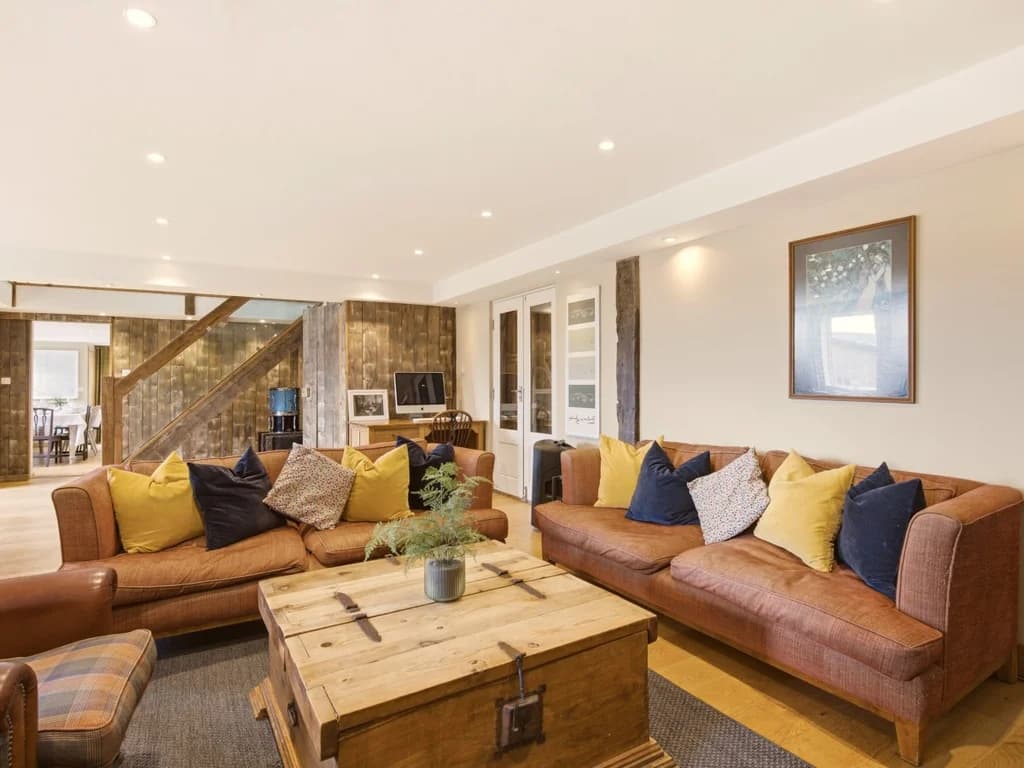 Spacious kitchen and dining area with island and garden access