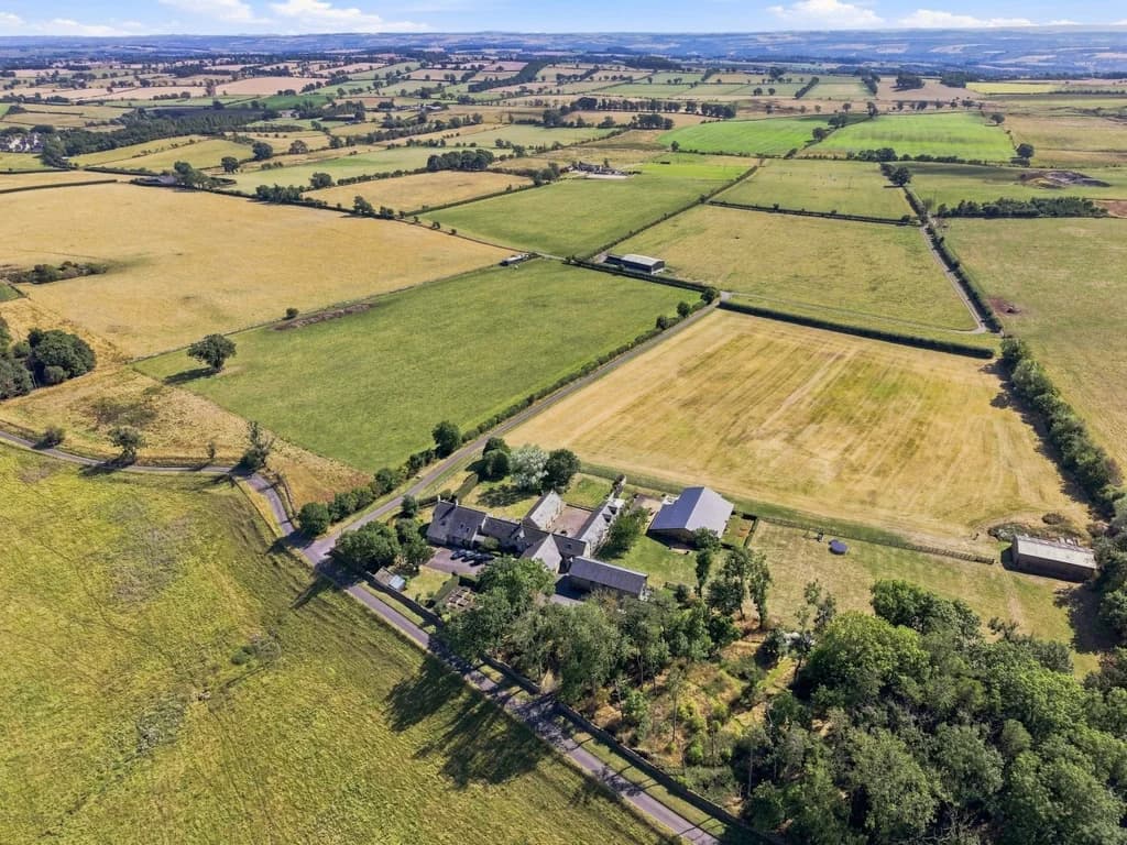 Roses Bower estate surrounded by open fields and farmland