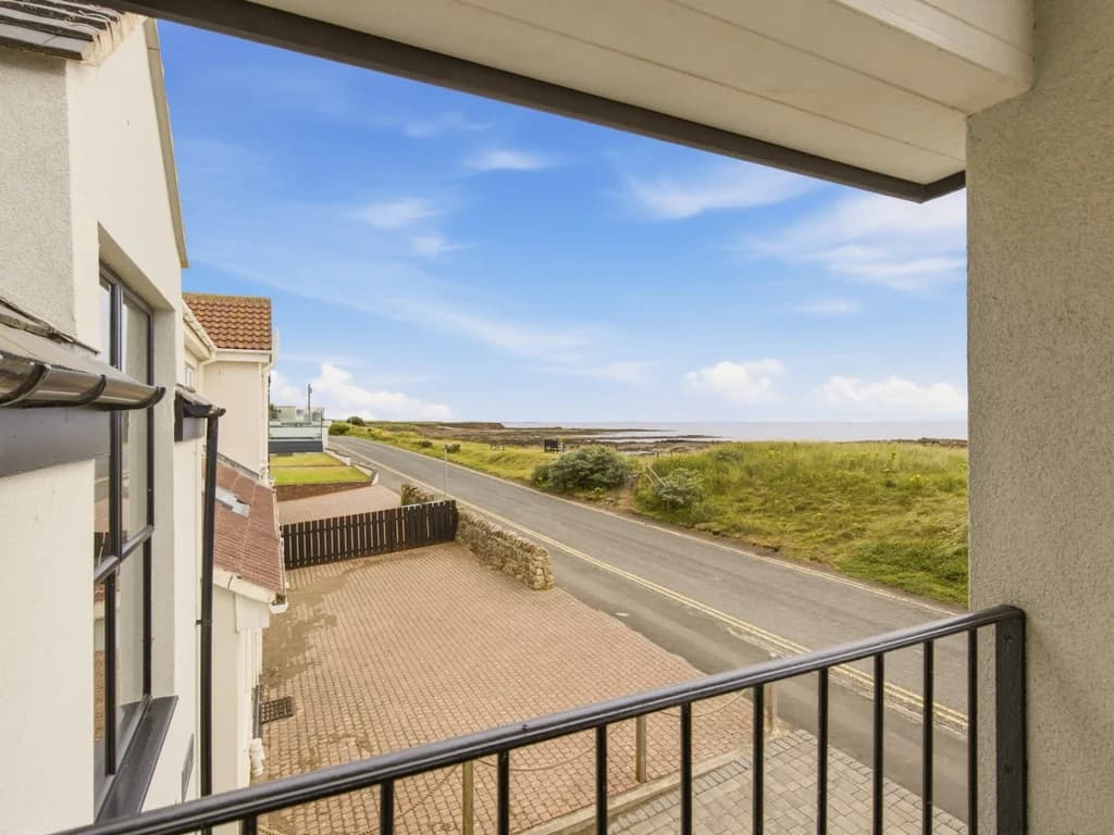 Balcony view overlooking Beadnell village and the Northumberland coastline