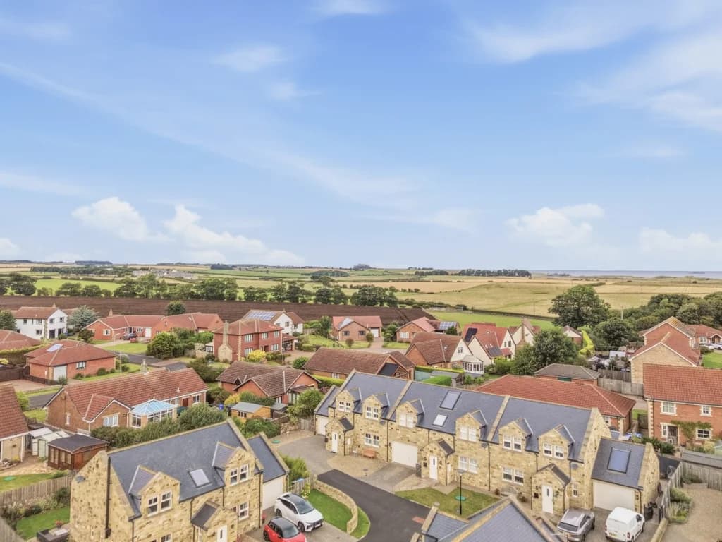 Aerial view over North Sunderland with open countryside beyond