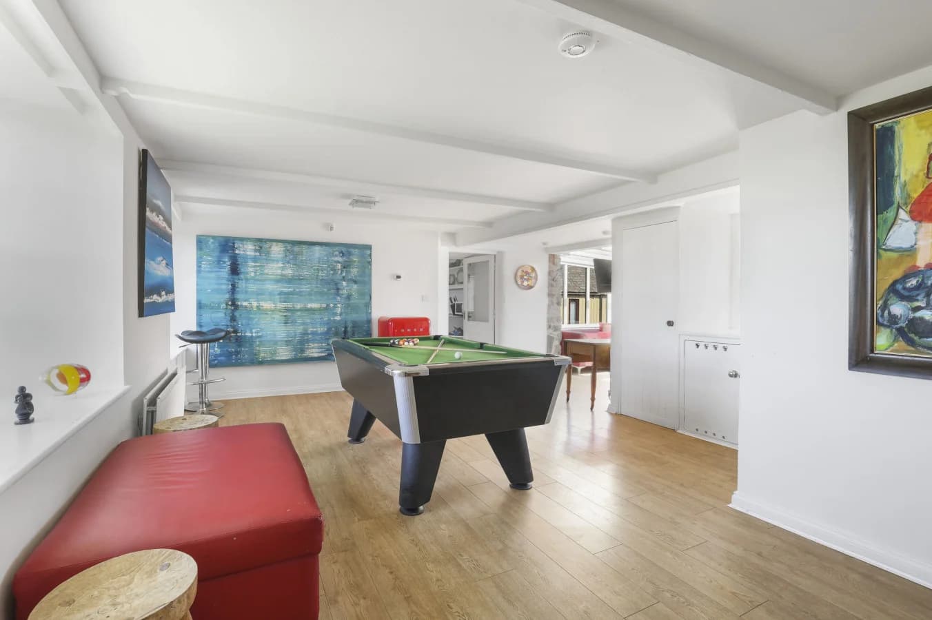 Games room with pool table and seating area