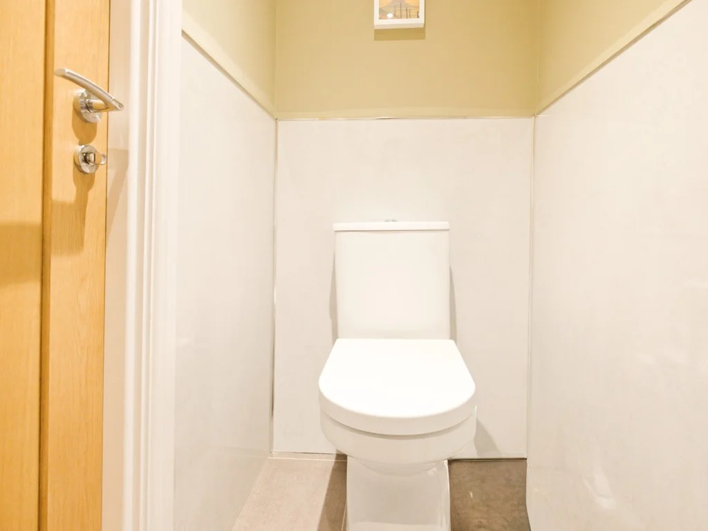 Separate downstairs WC with clean neutral finishes