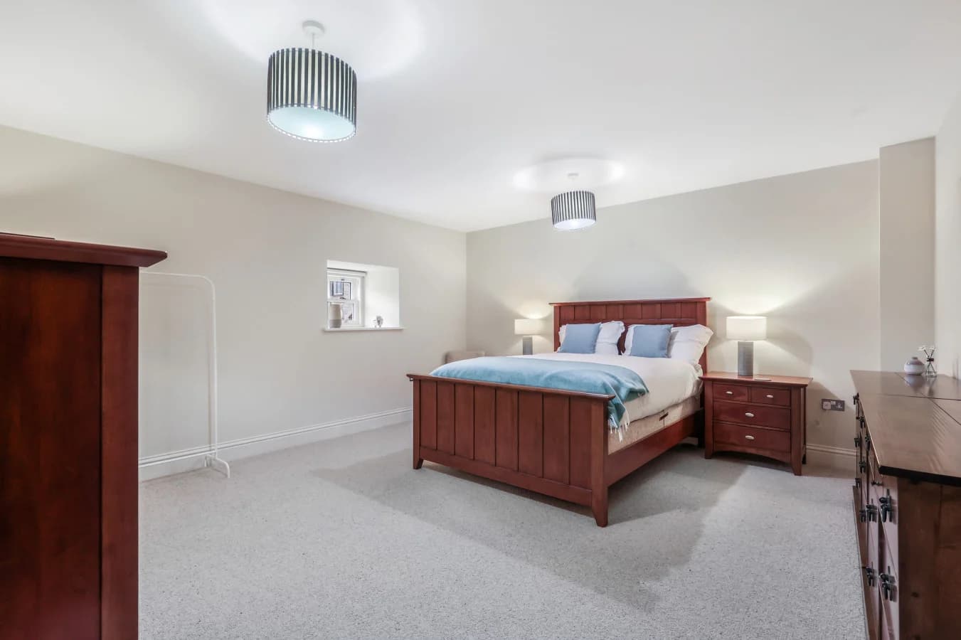 Spacious king bedroom with en-suite bathroom and dressing area
