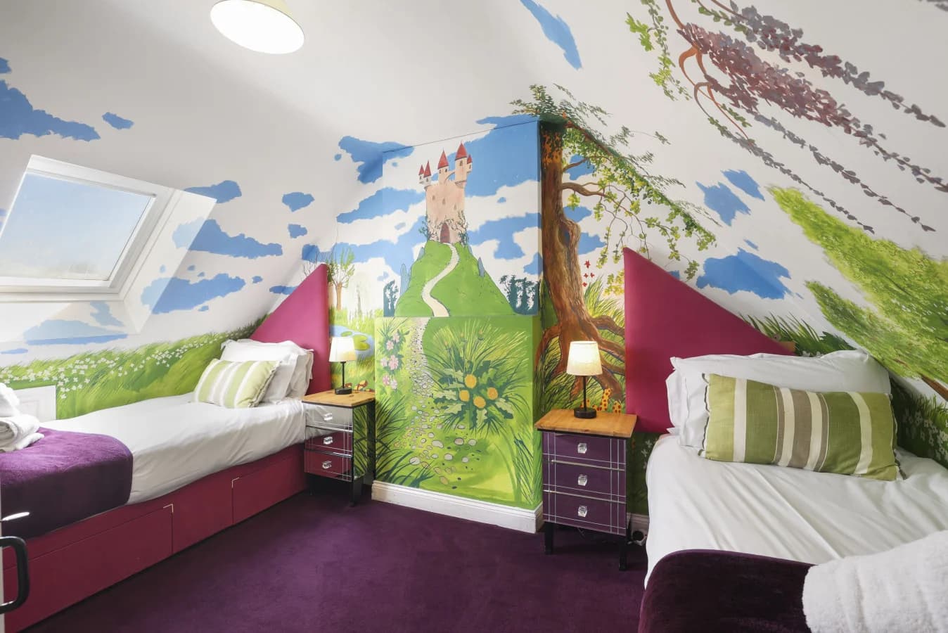 Twin bedroom with castle mural and purple carpet