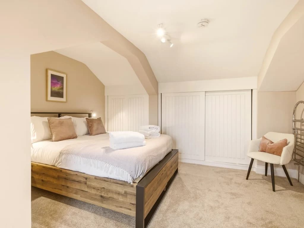 Flexible king zip-and-link with countryside views.