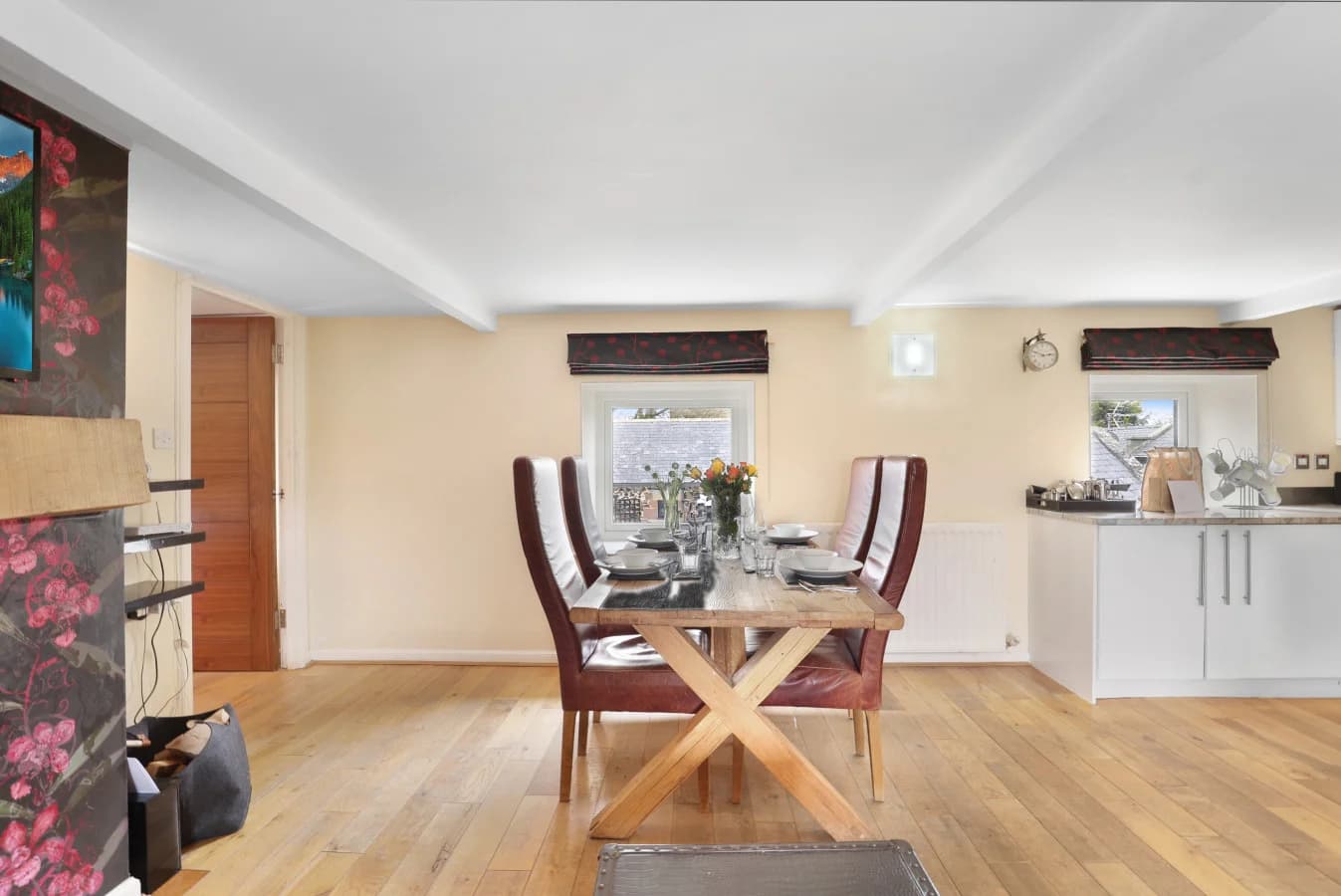 Dining area with seating for four beside the kitchen