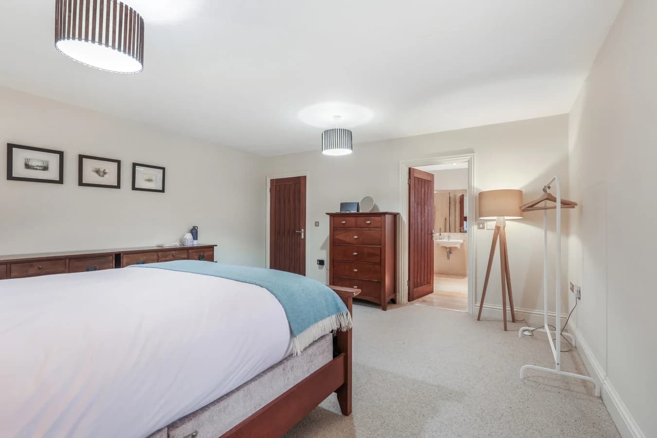 First-floor king bedroom with ample storage and seating area