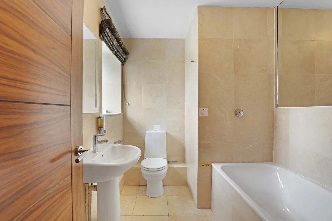 Family bathroom with bath, washbasin and toilet