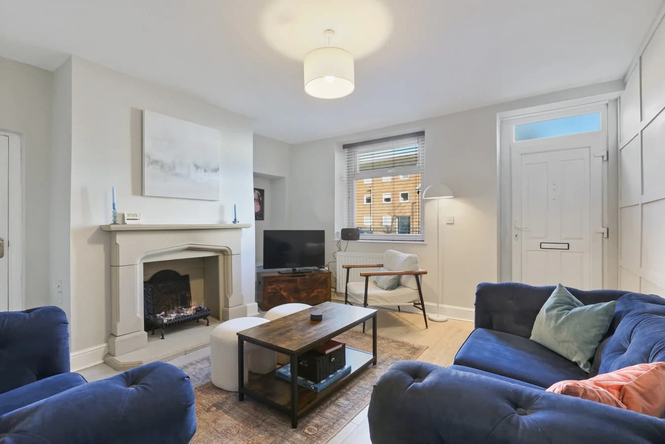 Bright and inviting living room blending classic features with modern comfort