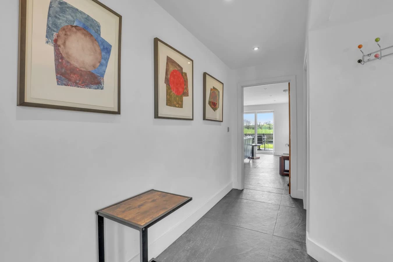 Bright entrance hallway leading through the luxury home
