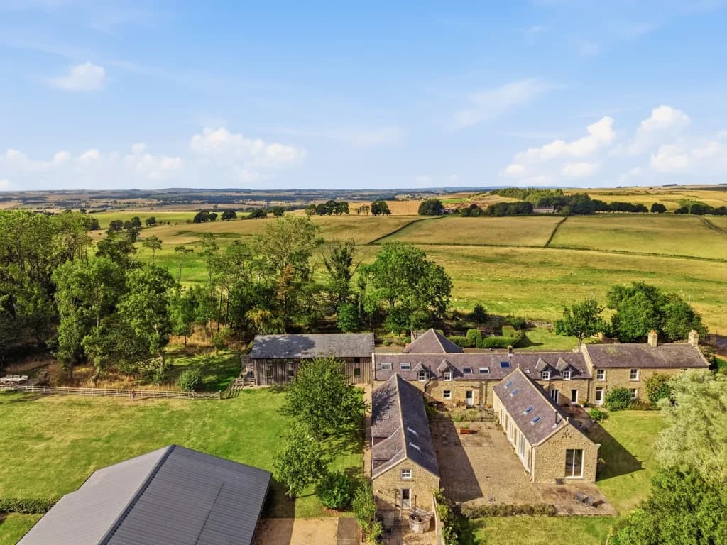 Aerial view across Roses Bower and the surrounding rolling countryside