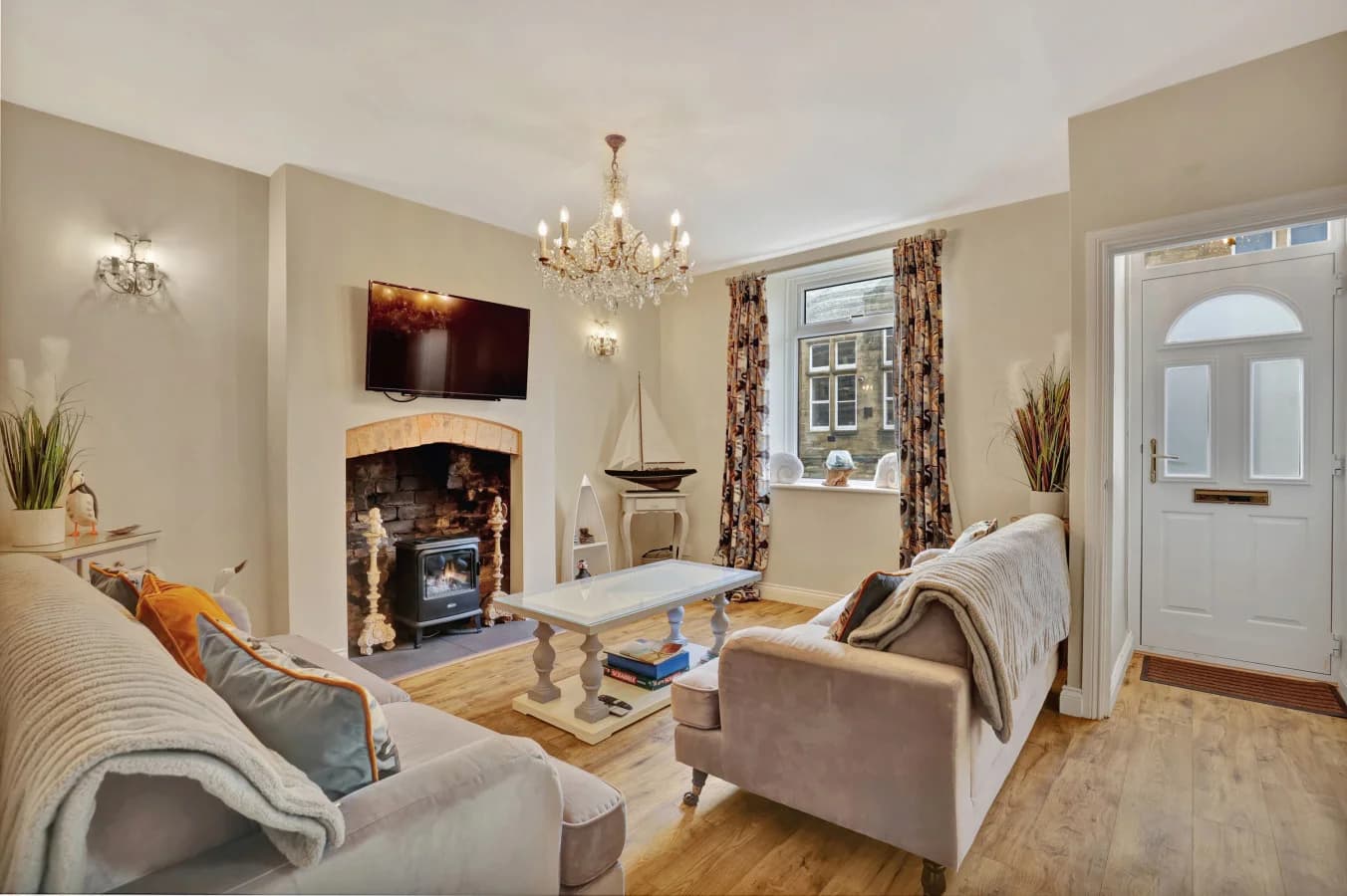 Cosy living room with feature fireplace and street-facing window