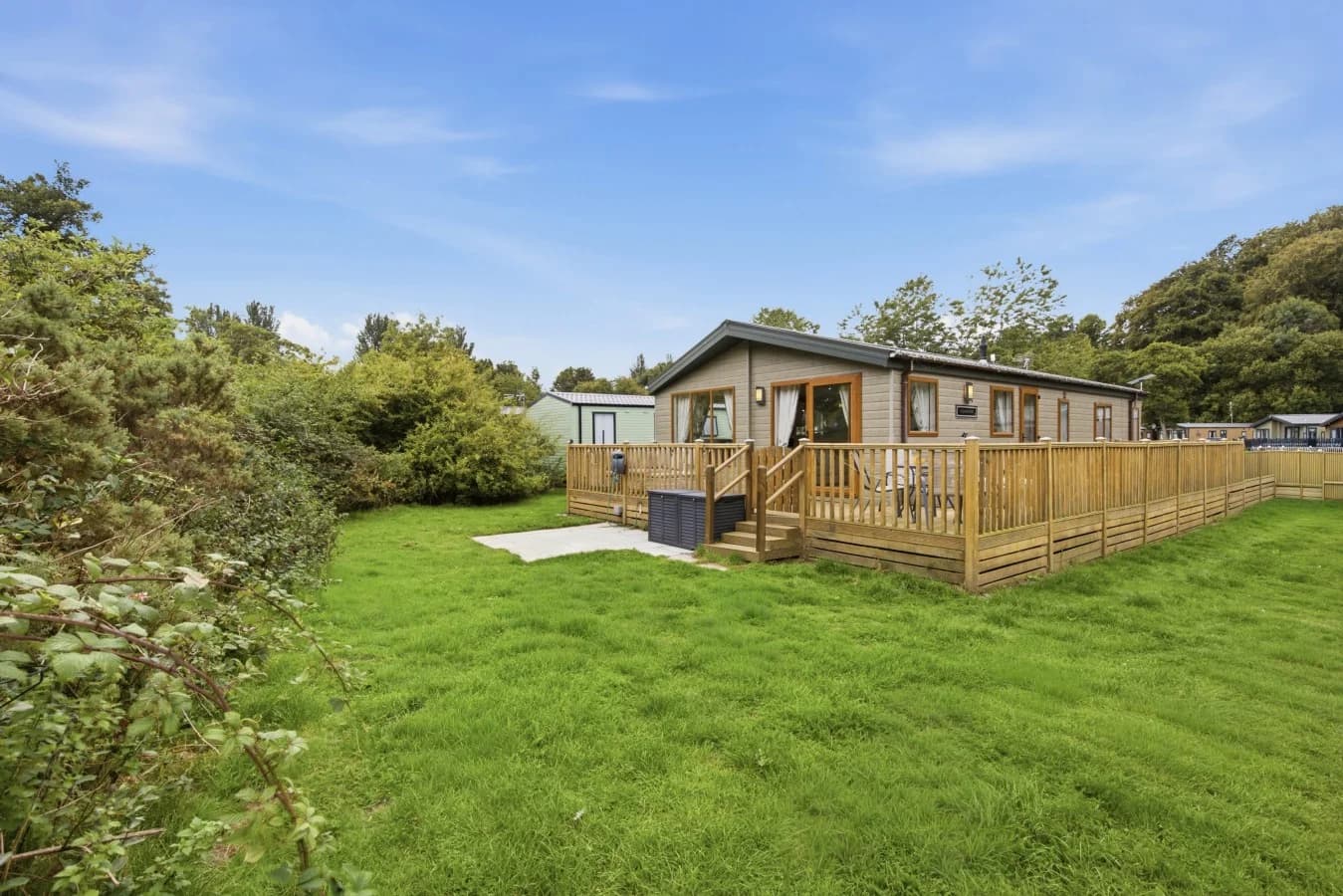 Cheviot Retreat Lodge with wraparound decking and spacious lawn