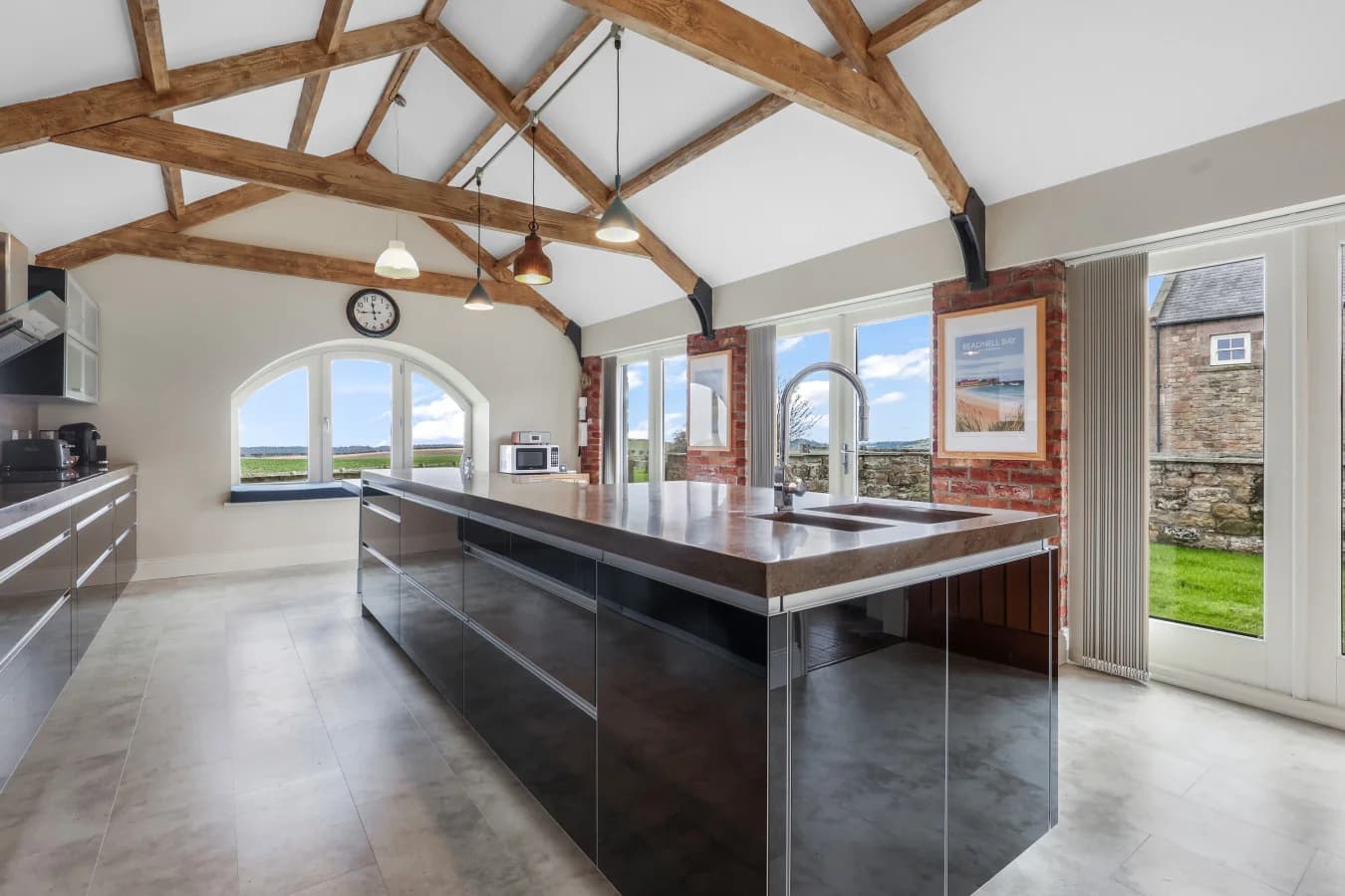Modern kitchen with large island and integrated appliances