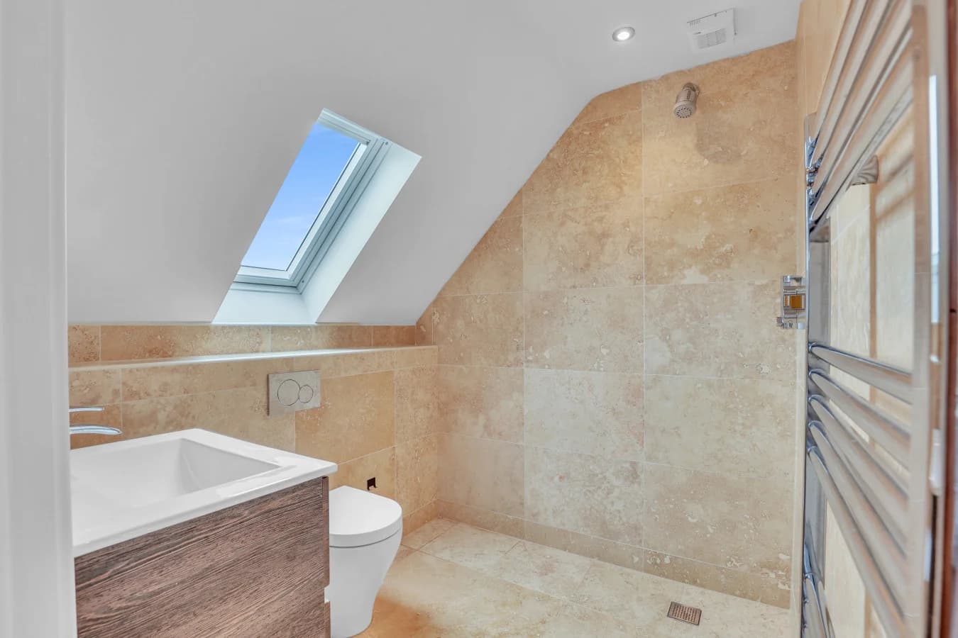 Modern ensuite with walk-in shower and skylight window