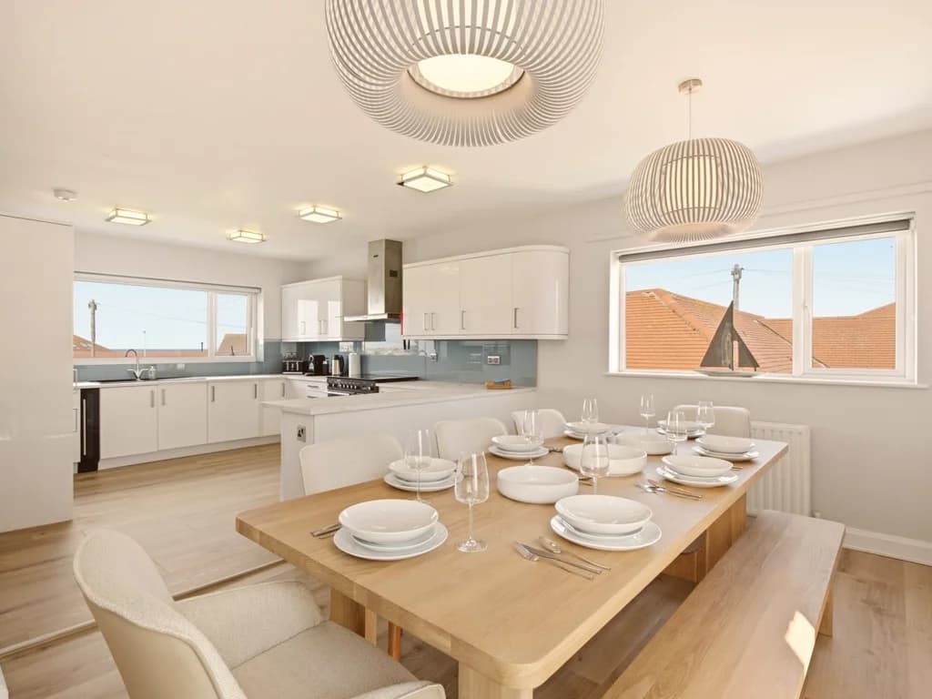 Open-plan kitchen and dining area designed for relaxed meals with family and friends