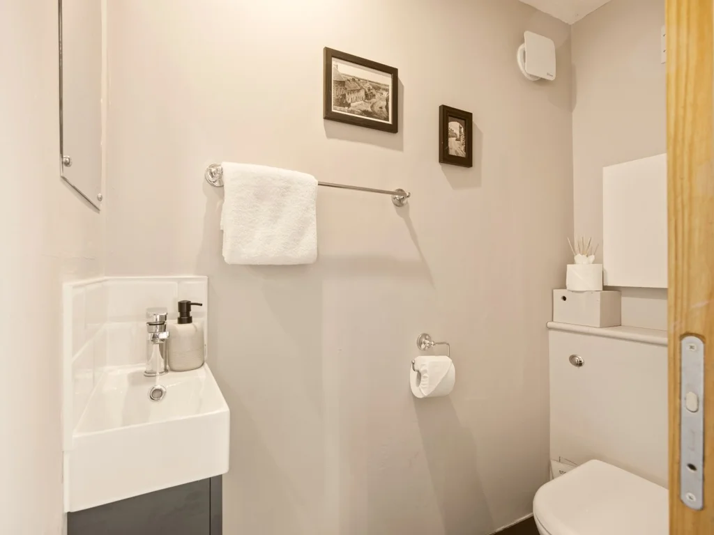 Convenient ground floor WC with wash basin.