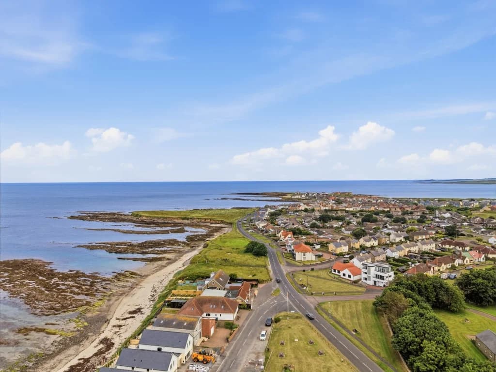 Spectacular coastal panorama stretching across Beadnell Bay and the shoreline