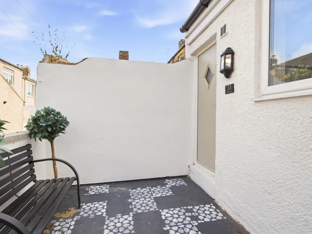 Traditional stone terrace with private entrance.