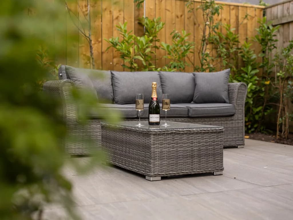 Comfortable outdoor lounge set on the private patio for relaxing evenings