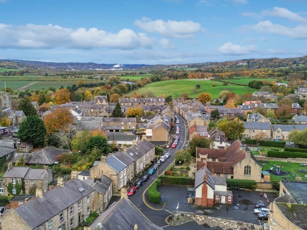 Aerial view over Corbridge village and the surrounding Tyne Valley.